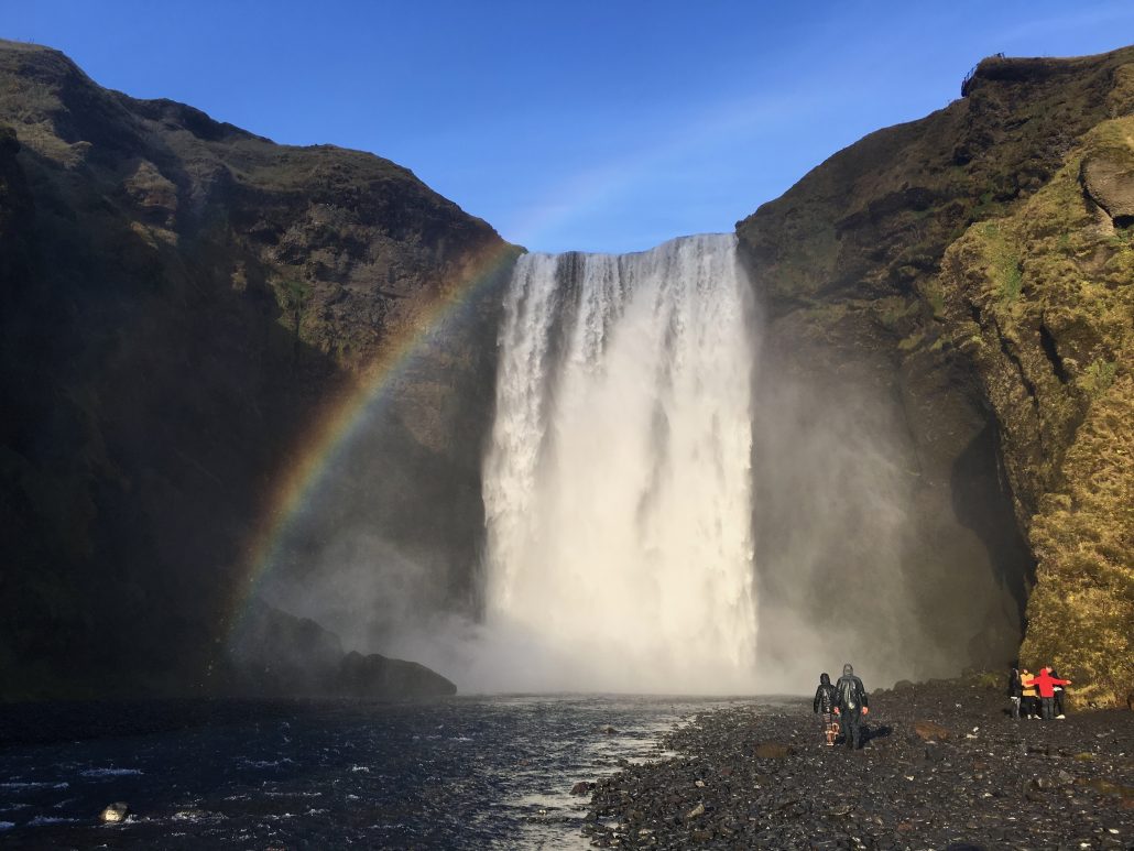 Image of a rainbow over a waterfall