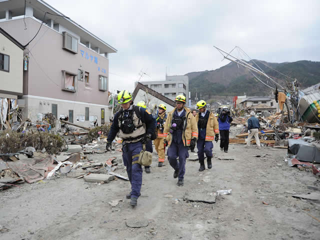 an image showing a rescue team following the 2011 tsunami in Japan