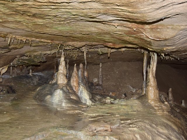 A stalactite, stalagmite and pillar in a limestone cave