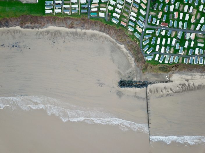 Terminal groyne, rock armour and cliff slumping