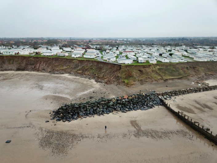 Terminal groyne, rock armour and cliff slumping