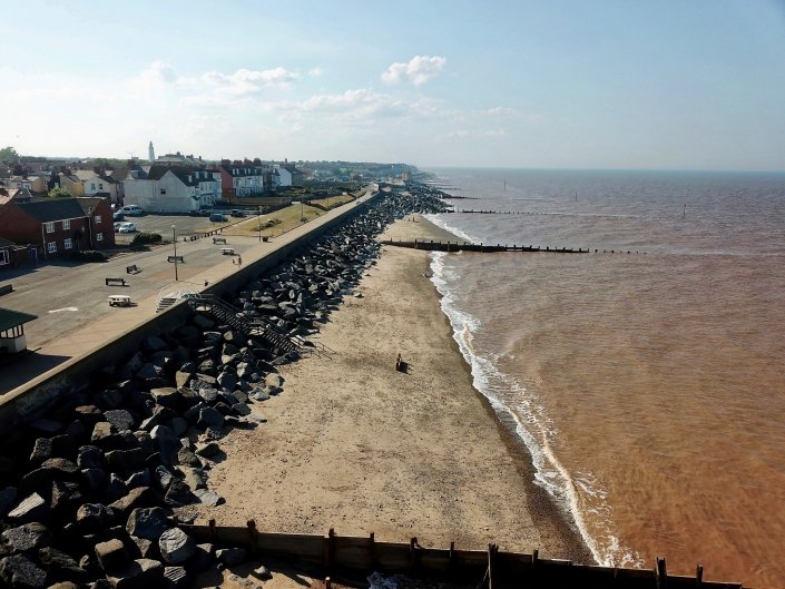 Sea wall, rock armour and groynes at Withernsea - view north