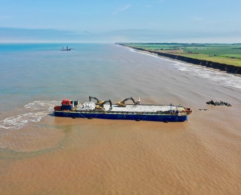 Barge and support craft at Withernsea