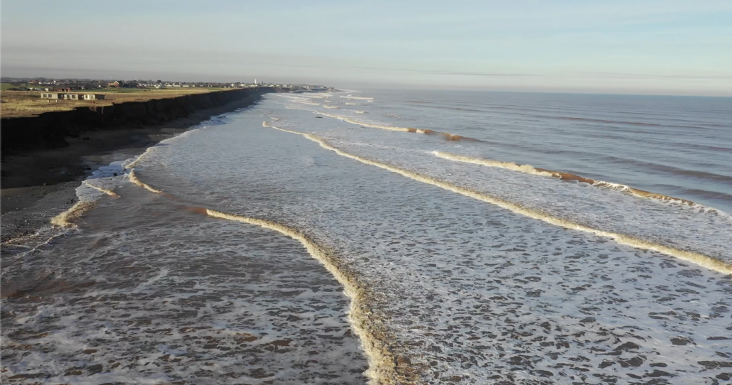 Flying over constructive waves