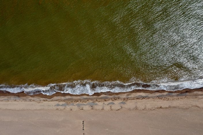 Aerial view of waves approaching Spurn Point