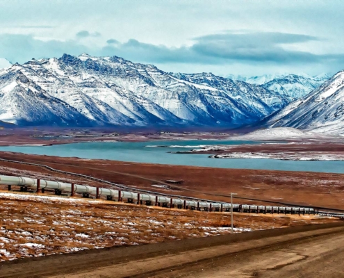 A road and oil pipeline on Alaska's North Slope
