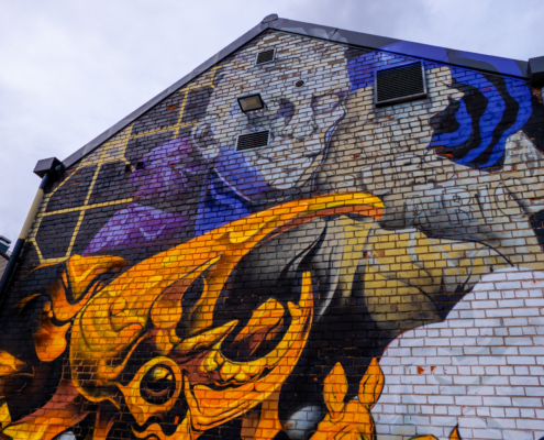 A large mural on the back of a building on Humber Street.