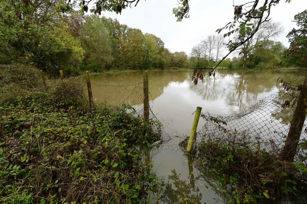 Flooded public footpath and farmland in Horley, Surrey on November 2nd 2023 after Storm Ciaran