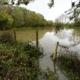 Flooded public footpath and farmland in Horley, Surrey on November 2nd 2023 after Storm Ciaran