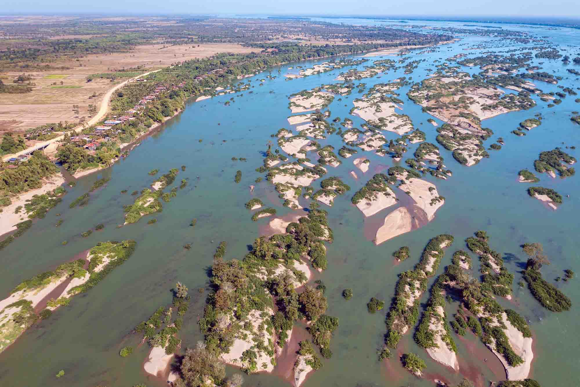 Sand bars and islands on the Mekong River in Cambodia formed by deposition due to reduced discharge 