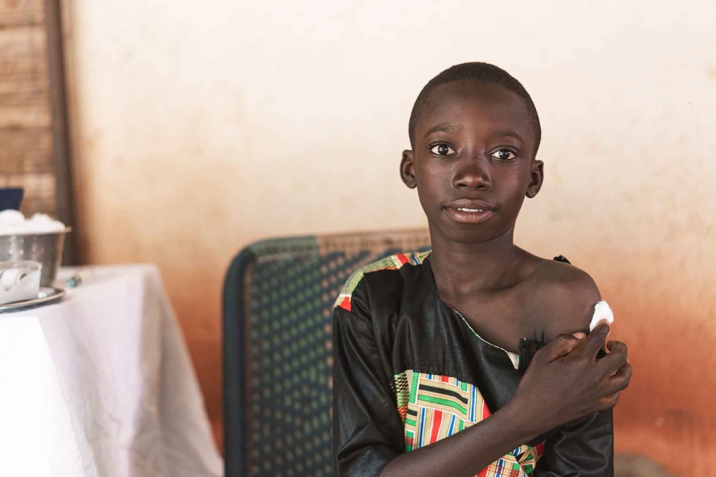 Boy receiving immunisation