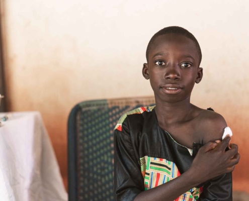 Boy receiving immunisation