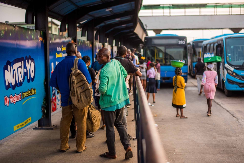 People queue for a bus on the Lagos BRT System