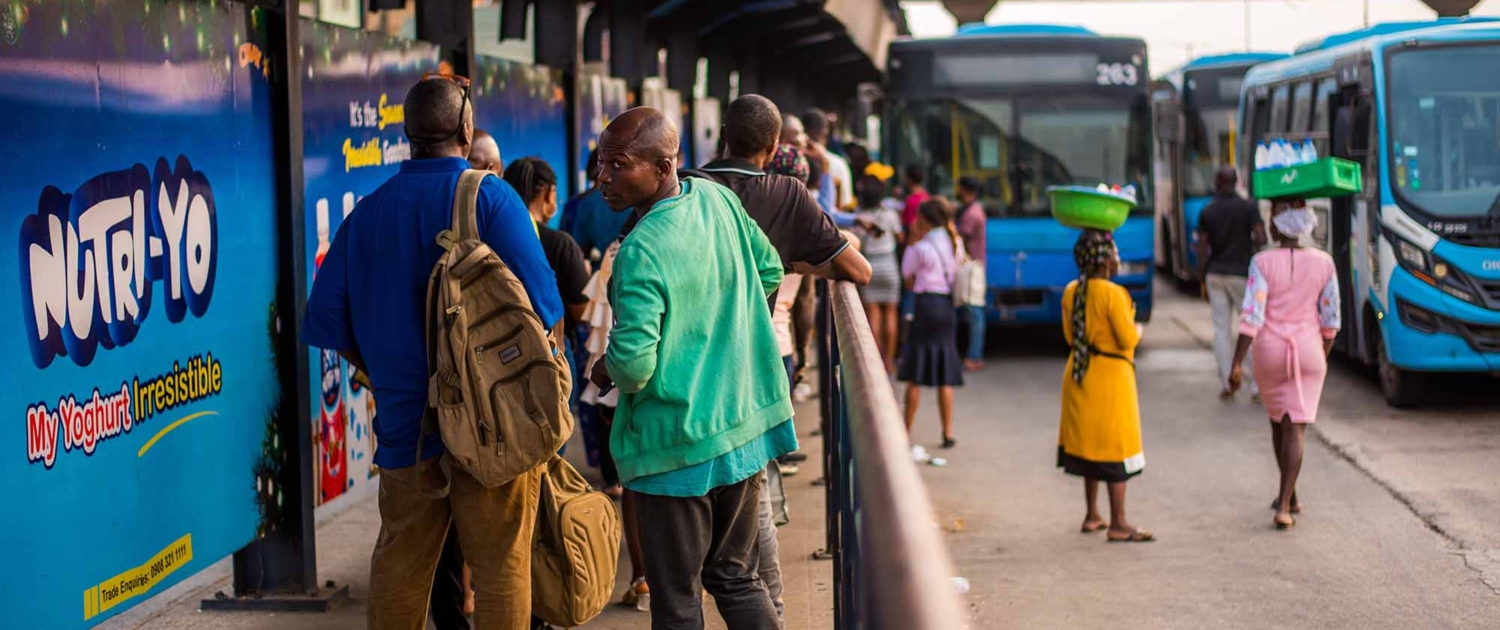 People queue for a bus on the Lagos BRT System
