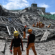 Emergency services work at the site of a collapsed building following the earthquakes in Caracas